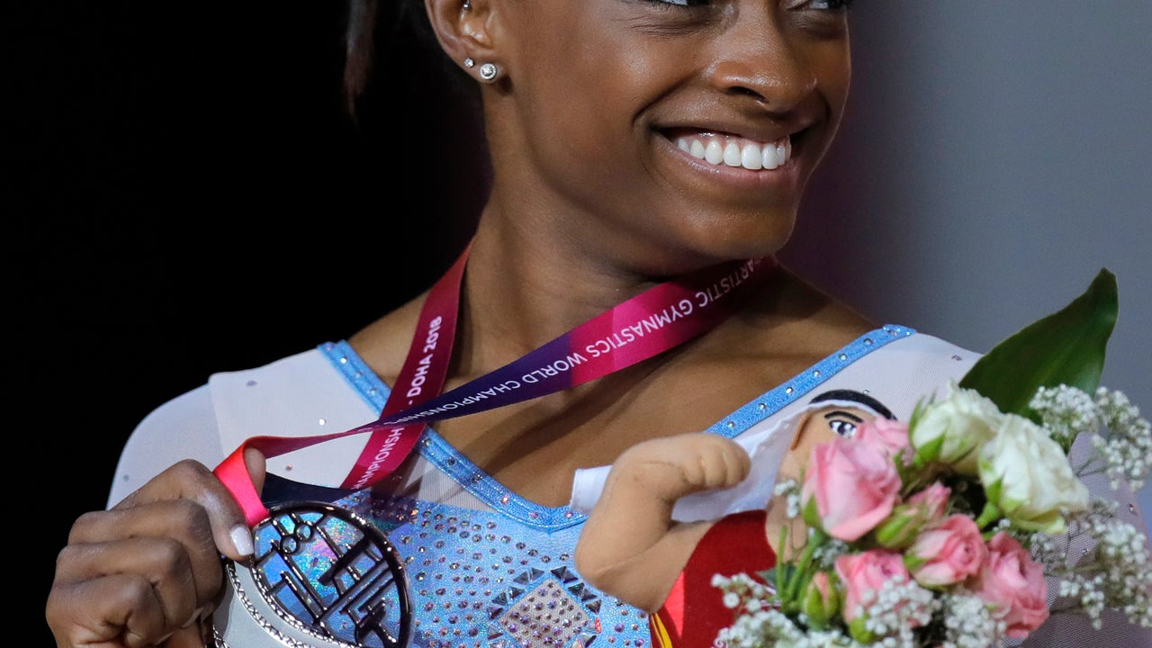 Biles sets record by picking up 13th world championship gold